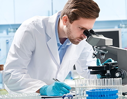 Doctor Looking in microscope
